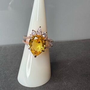 Elegant Lab Created Yellow Topaz on a Rose Gold Plated Ring